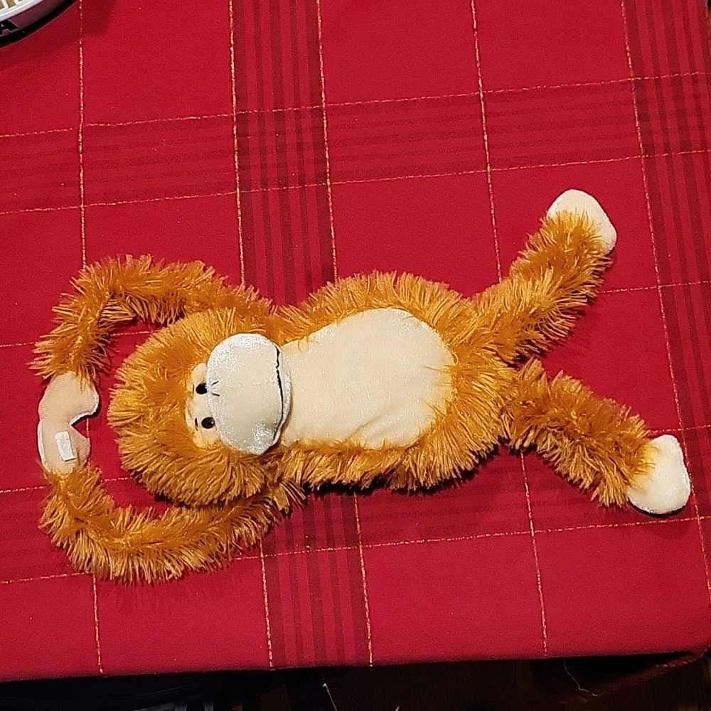 Dave & Buster Super soft hanging monkey 12"  EUC